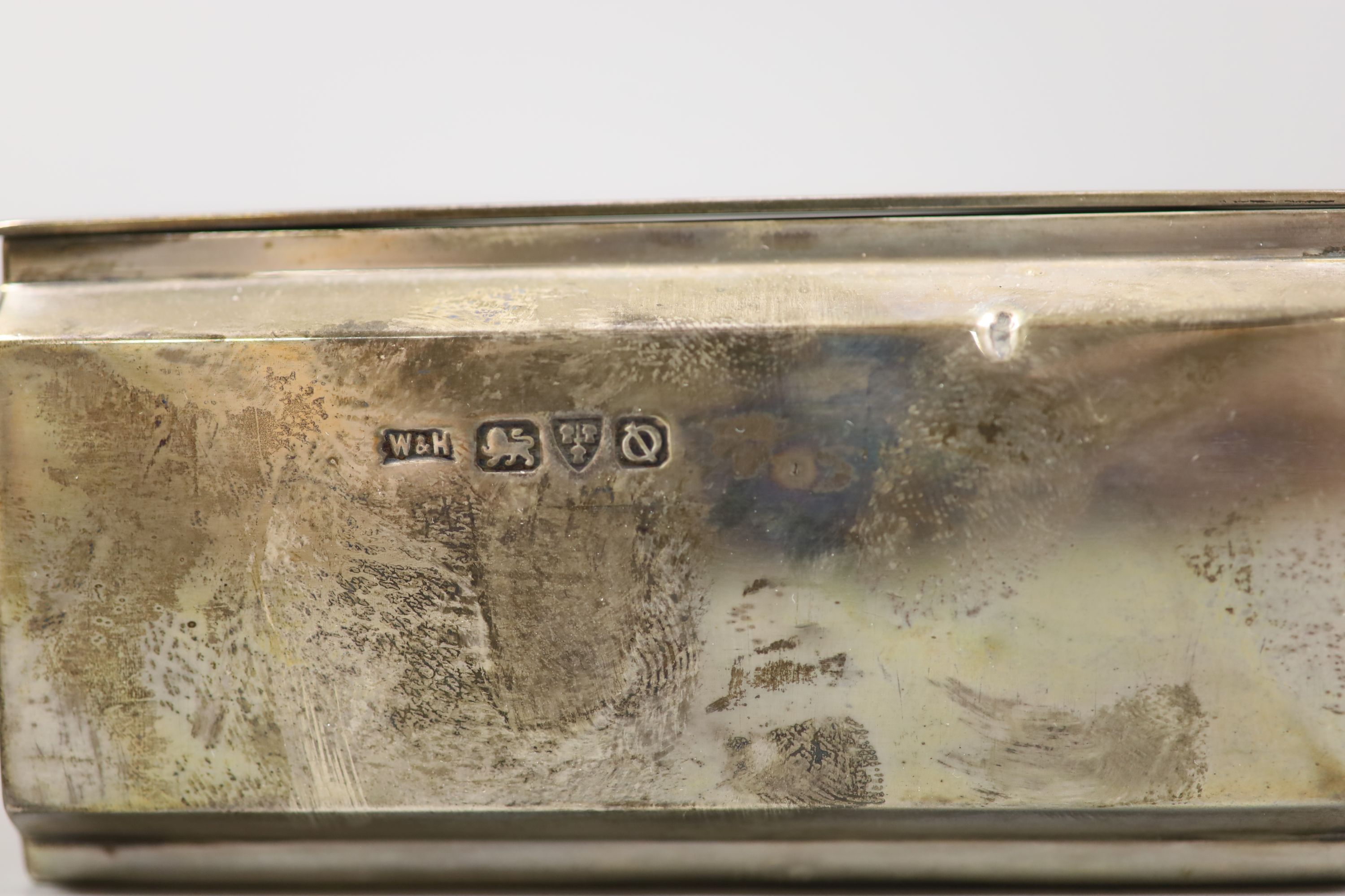 A George VI Art Deco engine turned silver cigarette case, by Walker & Hall, Chester, 1939